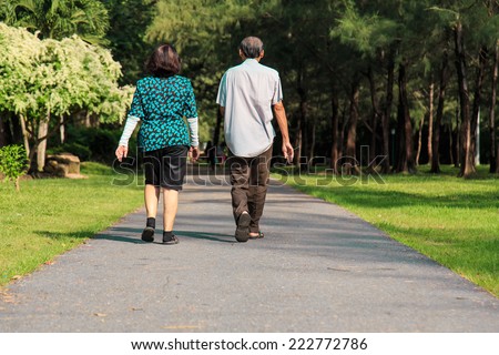 Old people walking in the park