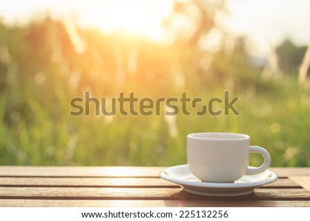 Coffee cup on the table in the morning