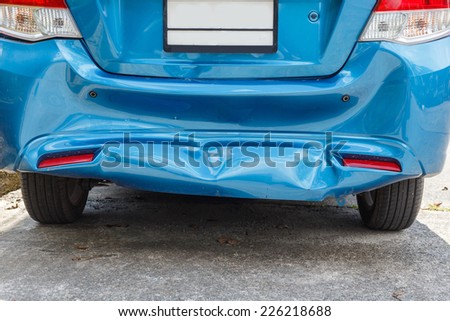 Body of blue car get damaged by accident