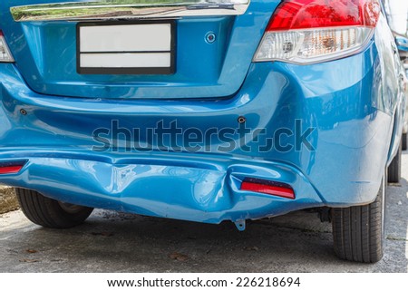 Body of blue car get damaged by accident