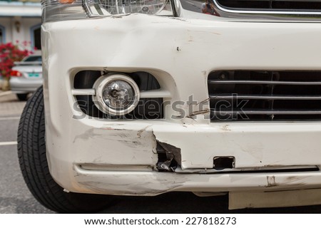 Body of white van get damaged by accident