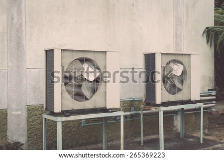 Air conditioning compressor near the wall