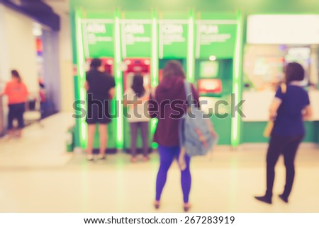 Blurred background : People in the bank with retro filter effect