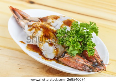 Traditional japanese food, Grilled king tiger prawn on wooden table