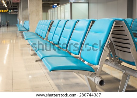 Close up row of blue chair in the airport