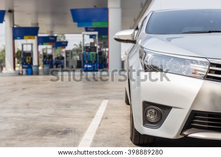 Front of new silver car parking in gas station in Thailand