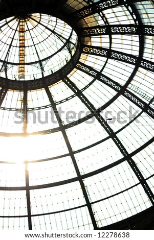 The dome of the wonderful gallery Vittorio Emanuele between the duomo and P.za della Scala in Milan (Italy).