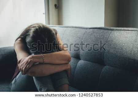 panic attacks young girl sad and fear stressful depressed emotional.crying use hands cover face begging help.stop abusing violence in women,person with health anxiety,people bad feeling down concept