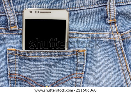White phone in jeans pocket