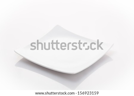 one empty square plate isolated on a white background