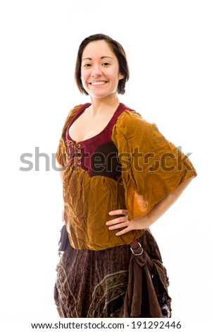 Young woman smiling with her arms akimbo