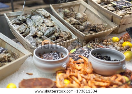 Oysters and shrimps for sale in fish market