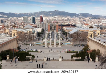 Columns near magic fountain with Venetian Towers in the background, Barcelona, Catalonia, Spain
