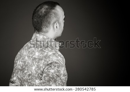 model isolated on plain background back looking behind