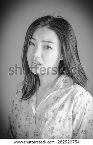 Attractive 30 years old caucasian man shot in studio isolated on a white background, black and white image