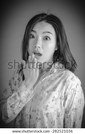 Attractive 30 years old caucasian man shot in studio isolated on a white background, black and white image