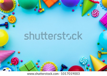 Birthday party background with party hats and candy