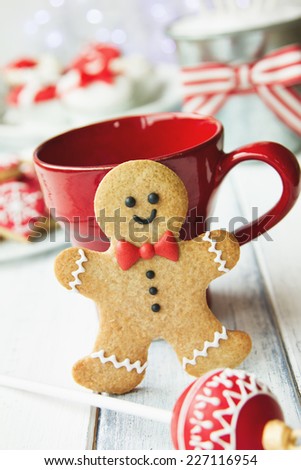 Gingerbread man and red mug