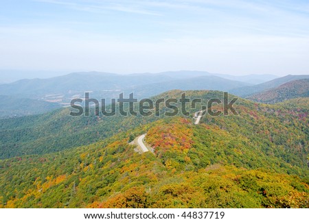 mountain overlook of hills with fall leaves