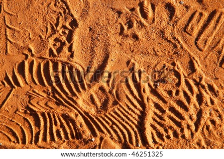 orange sand footprints