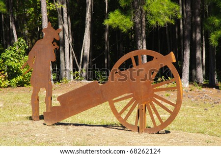 soldier and cannon shaped battlefield metal statues