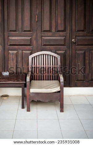 old wooden chair with wooden table at home