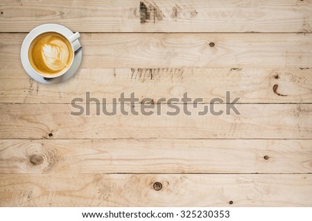 coffee cup on wood table with space