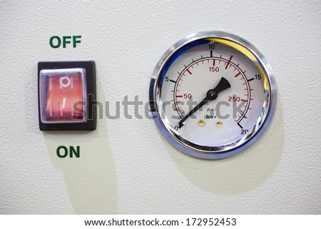 Manometer and on/off switch as a part of some kind of machine