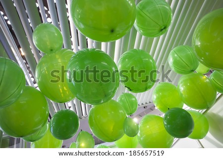 Green balloons on the ceiling