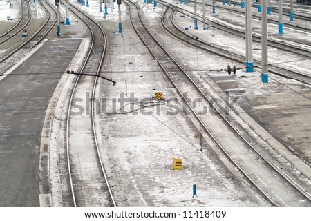 ways on railroad station, winter, snow.