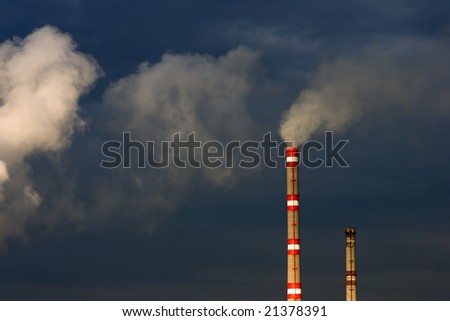 exhaust and clouds of smoke in sky