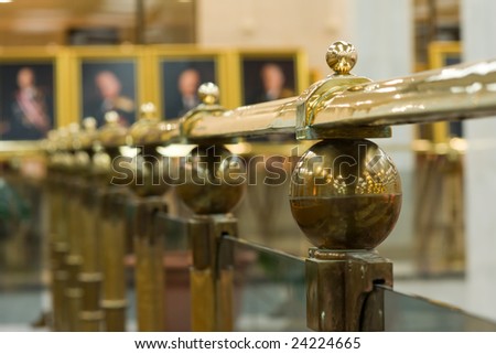 gold railing in picture gallery