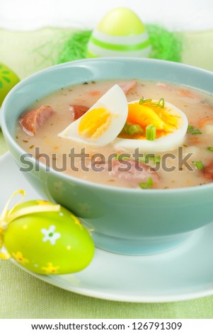 White borscht with eggs and white sausage. Polish traditional easter soup