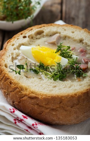 easter white borscht with eggs and sausage in bread bowl
