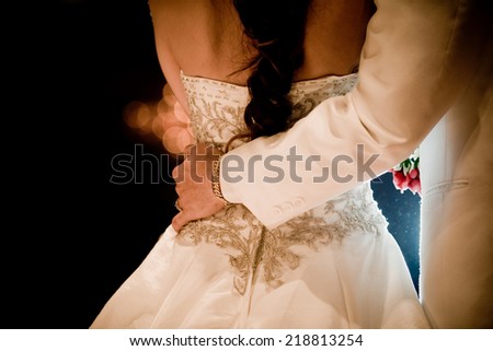 wedding dress and wedding gown hugging