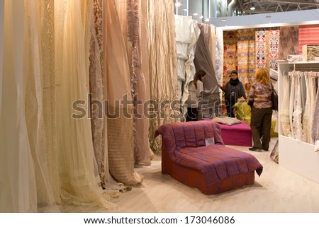 PARIS, FRANCE - JANUARY 24, 2014: People visit home design stands at Maison&Objet, the French leading professional trade show for home fashion in Paris, France.