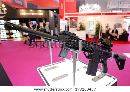 PARIS, FRANCE - JUNE 17, 2014: Submachine guns are on display at Eurosatory, the largest international land and air-land defense and security exhibition in Europe.