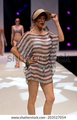 PARIS, FRANCE - JULY 5, 2014: Models walk the runway at Mode City, a swimwear and lingerie tradeshow where over 20,000 buyers meet 500 exhibitors from 35 different countries.