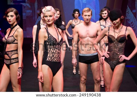 PARIS, FRANCE - JAN. 25, 2015: Models walk the runway at the International Lingerie Show in Paris where over 20,000 buyers meet 500 exhibitors from 37 different countries.