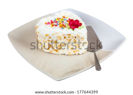 Cake in the shape of heart on plate isolated on white background with clipping path