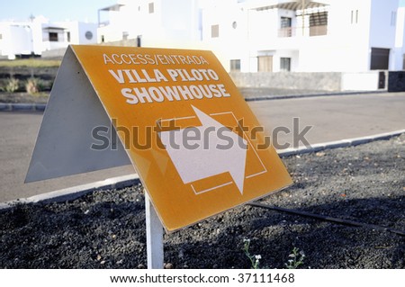 Yellow sign of real estate agency