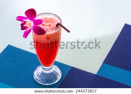 Watermelon cocktail on the table by the sea.