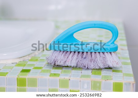 Blue cleaning brush isolated on white background