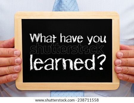 What have you learned ? - Businessman with chalkboard