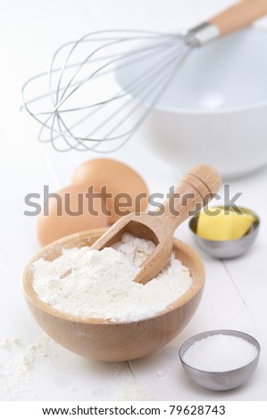 raw food, flour, eggs, sugar, butter to make a cake