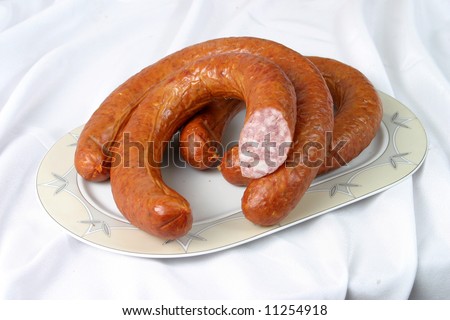 Ready smoked sausage on a plate