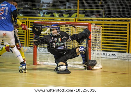 LODI, ITALY - SEPT 10: Italian hockey skates  player Cristian Rossi in action during a match of the 2012 championship at Italy September 10, 2012 in Lodi, Italy