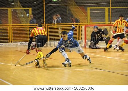 LODI, ITALY - SEPT 10: Italian hockey skates  player Cristian Rossi in action during a match of the 2012 championship at Italy September 10, 2012 in Lodi, Italy