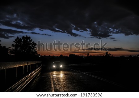 Car in the temporal at sunset Car in the temporal at sunset
