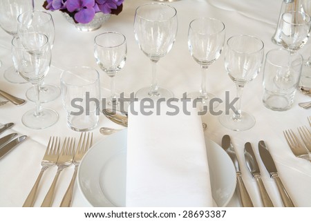 table setting for fine dining or party. cutlery and plate in restaurant set up for wedding celebration